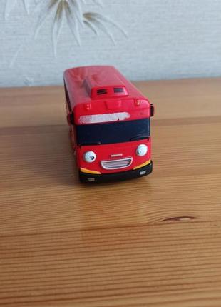 Червоний автобус  тауо