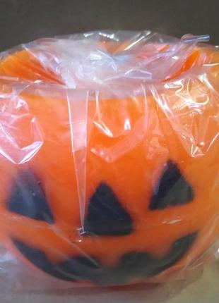Свічка гарбуз/хеллоуїн у великому пластиковому підсвічнику melinera для halloween. діаметр 14 см