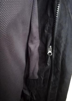 Куртка чорного кольору6 фото
