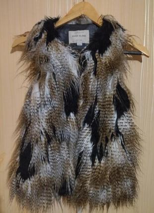 Жилетка на дівчинку 9 років