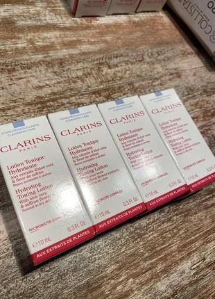 Догляд clarins9 фото