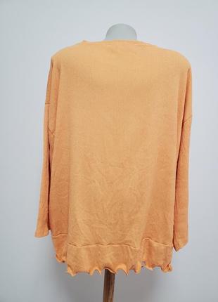 Дуже гарна брендова якісна трикотажна блузка абрикосового кольору5 фото