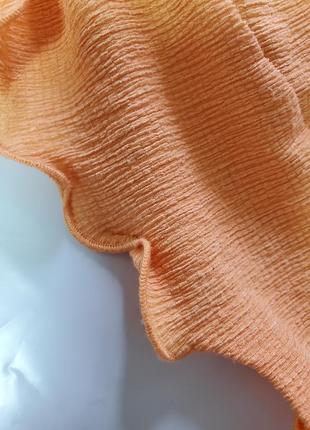 Дуже гарна брендова якісна трикотажна блузка абрикосового кольору8 фото
