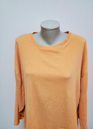 Дуже гарна брендова якісна трикотажна блузка абрикосового кольору3 фото