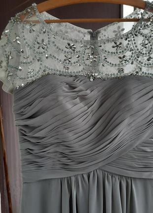 Розкішна сукня зі шлейфом3 фото