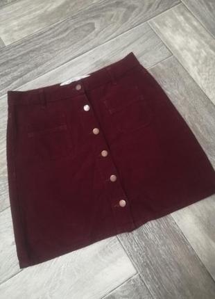 Натуральна спідничка з гудзиками