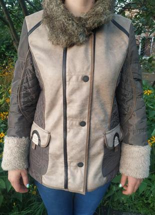 Тепла куртка зі штучного хутра німеччина8 фото