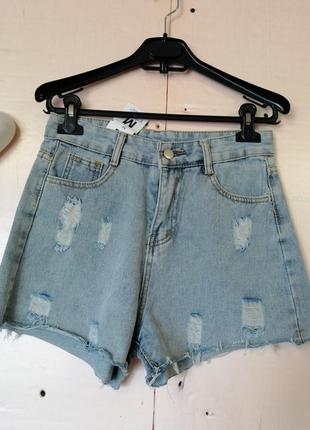 Рваные джинсовые шорты рвані джинсові шорти