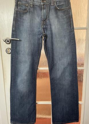 Классические джинсы от известного бренда.1 фото