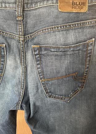 Классические джинсы от известного бренда.5 фото