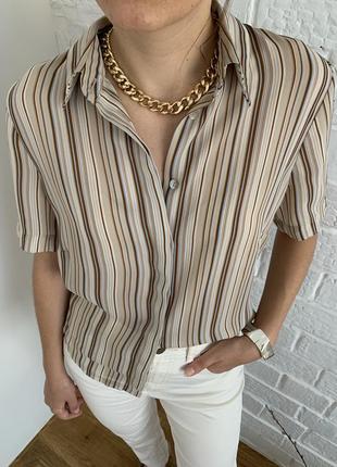 Стильна блуза з коротким рукавом1 фото