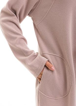 Трикотажне жіноче теплу сукню міді з рукавами-регланами і кишенями3 фото