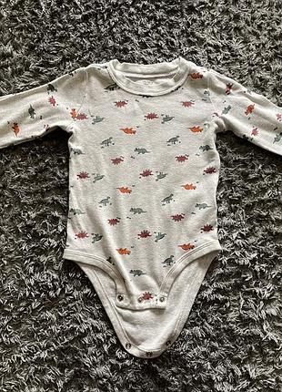 Чоловічок з динозаврами