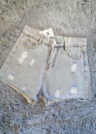 Джинсовые шорты  рванка джинсові шорти рванка1 фото