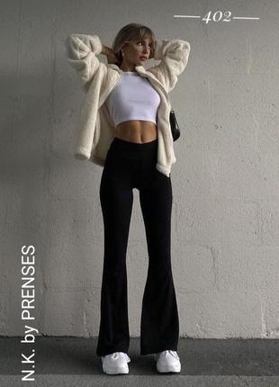 Модні трикотажні штани легінси клеш матовий біфлекс чорний l1 фото
