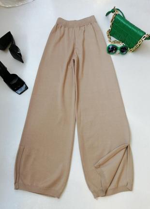 Вязаные брюки палаццо с разрезами2 фото
