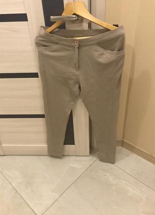 Бежеві штани лосіни в стилі casual