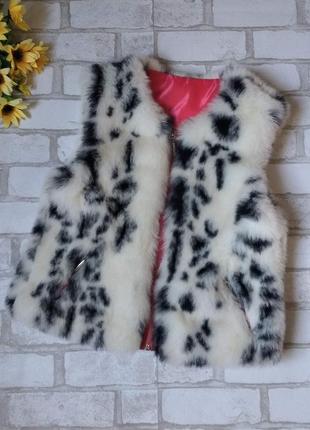 Жилетка меховая на девочку белая пятнистая