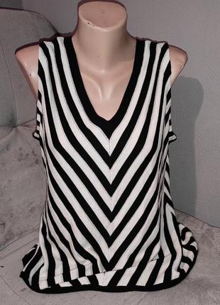 Жіноча жилетка