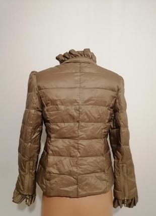 Жіноча курточка.5 фото