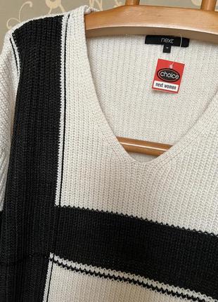 Очень красивый и стильный брендовый вязаный свитер-оверсайз.4 фото