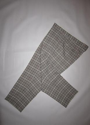 Стильні штани капрі в клітинку