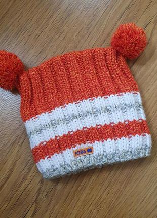 Якісна груба шерстяна вязана оранжева шапка 7-10 років.

дитяча тепла шапка