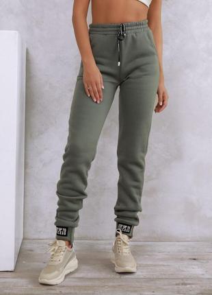 Теплые штаны с нашивками на манжетах. арт 122851 фото