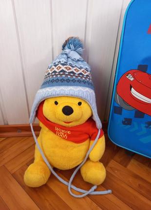 Утеплена зимова шапка на зав'язках