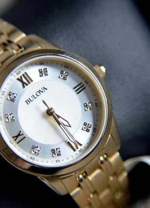 Жіночий годинник з діамантами bulova жовте золото6 фото