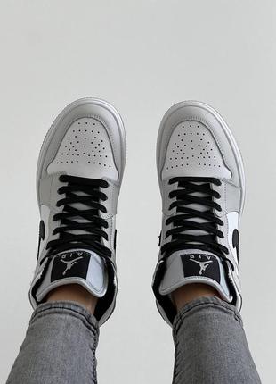 Женские кроссовки nike air jordan 1 mid большой выбор обуви7 фото