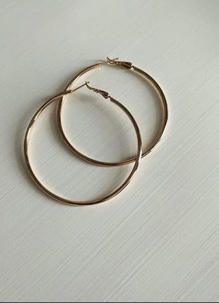 Серіжки нові