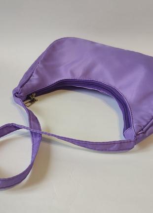 Фиолетовая сумочка с короткой ручкой9 фото