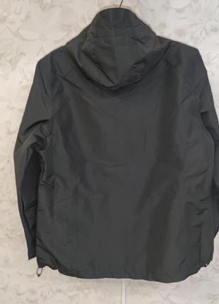 Жіноча водонепроникна куртка вітровка crivit з капюшоном на підкладці4 фото
