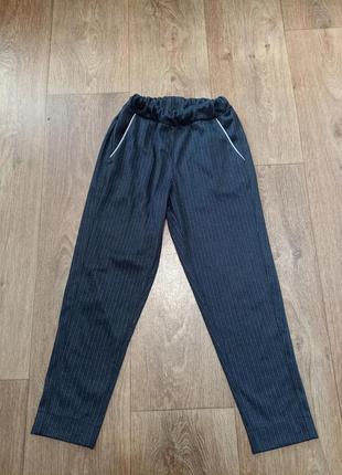 Штани з карманами