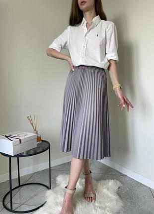 Плісерована спідничка міді