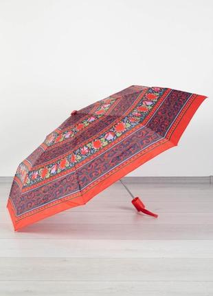 Жіноча парасолька з візерунками1 фото