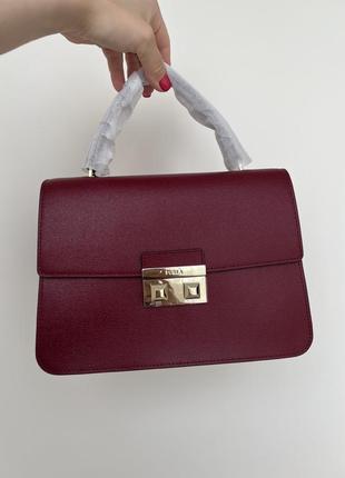 Жіноча сумка furla bella top handle бордового кольору