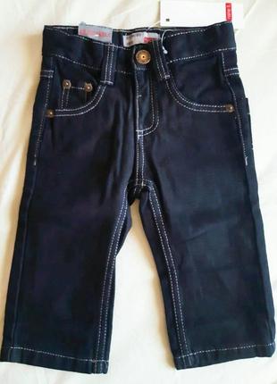 Черные джинсы с кармашками для мальчика 9 мес.2 фото