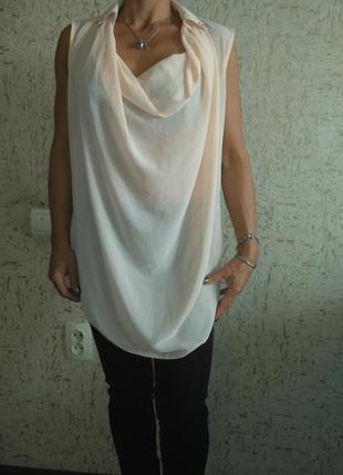Блуза кремова з оздобленням на комірці.1 фото