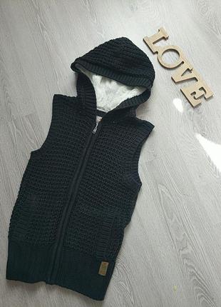 Шикарна жилеточка тепла