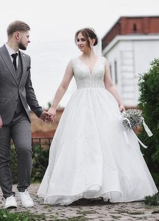 Весільна сукня в ідеальному стані (вдягалася 1 раз)7 фото