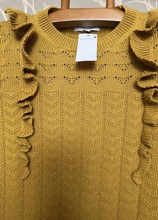 Очень красивый и стильный брендовый вязаный свитер.8 фото