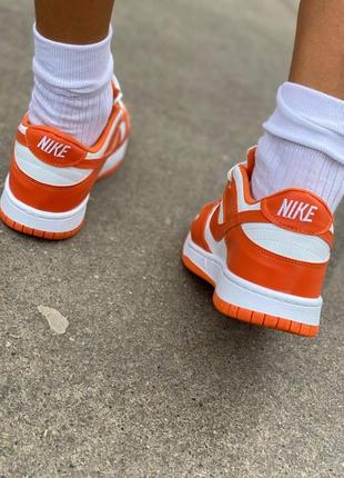 Жіночі кросівки nike sb dunk low orange white / smb2 фото