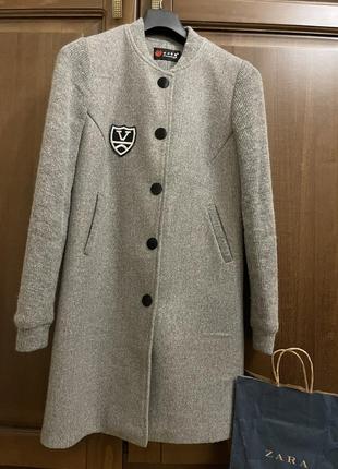 Тепле осіннє пальто