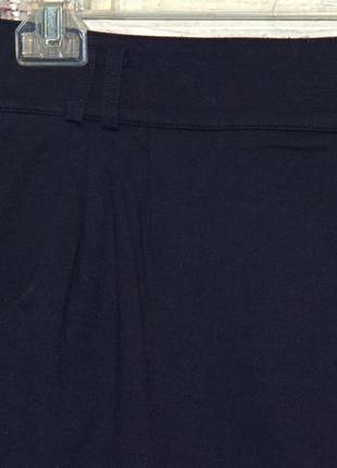 Крутая трикотажная юбка темно-синего цвета4 фото
