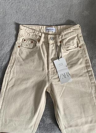Бежеві джинси від zara