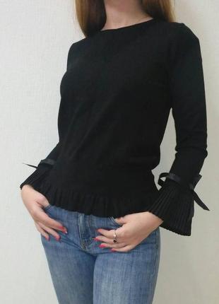 Пуловер черного цвета с рукавами гофре клеш италия1 фото