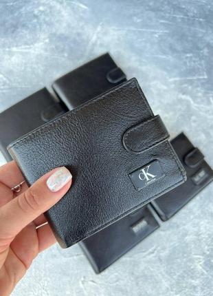 Чоловічий гаманець з фірмовим логотипом5 фото