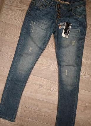 Фирменные джинсики с царапками3 фото